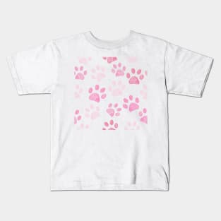 Pink doodle paw prints Kids T-Shirt